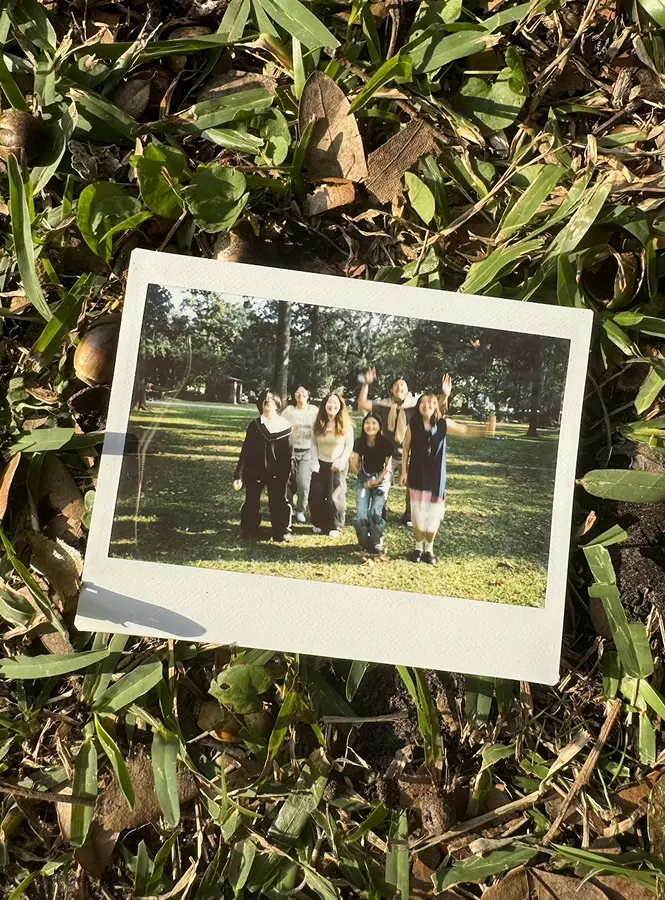 An instant photo of Wenjun and friends in Forsyth Park